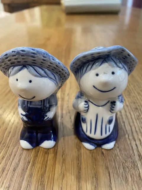 Salt and Pepper shakers blue and white farmers