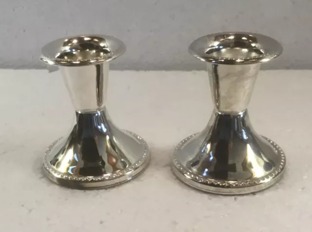 A Pair of Silver Plated Candlesticks/Candleholders.