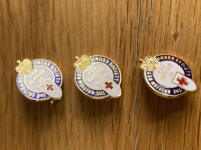 3 Red Cross Badges, 15, 30 And 35 Years Service Badges.