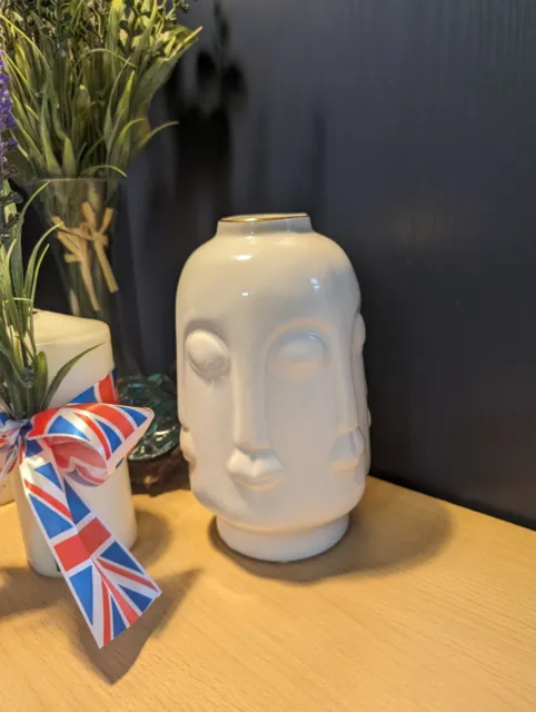 White Ceramic Faces Vase