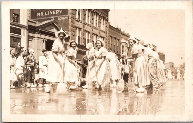 1930s HOLLAND, Michigan RPPC Photo Postcard "TULIP TIME" Street Cleaning Scene