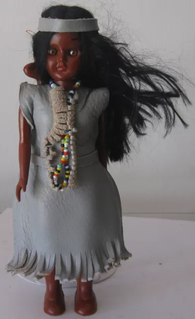Doll with a child in an Indian costume. 1970s.