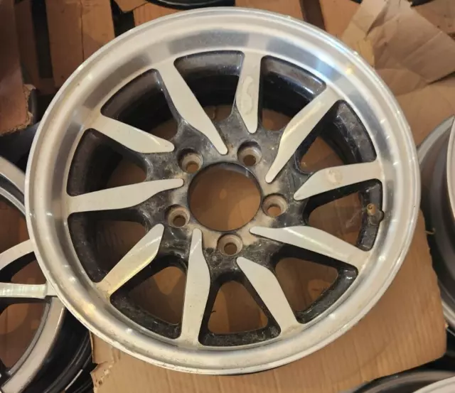 14" x 5" ALUMINUM TRAILER WHEEL 5-LUG ON 4.5 INCHES  -  Black
