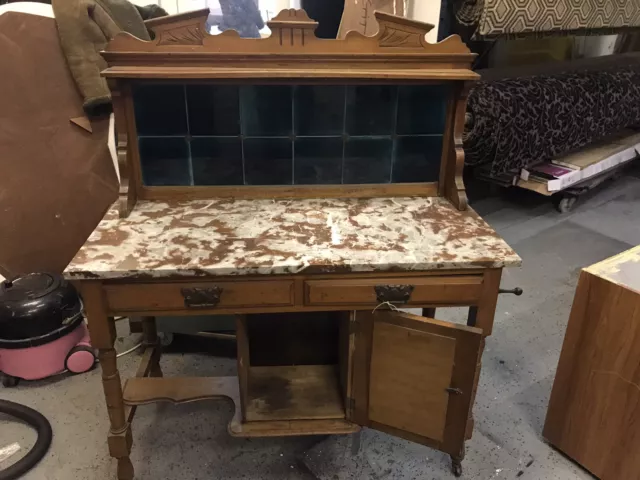 Antique wooden washstand marble top tiled back towel rails 2 drawers & cupboard