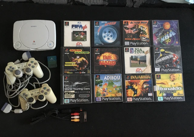 PS1] Console + câbles + 2 manettes + carte mémoire + housse