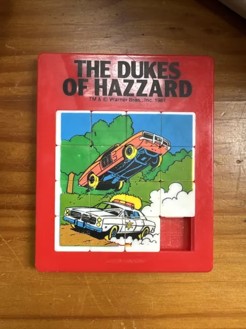 VINTAGE 1981 THE Dukes of Hazzard Sliding Tray Puzzle Toy red frame £20 ...