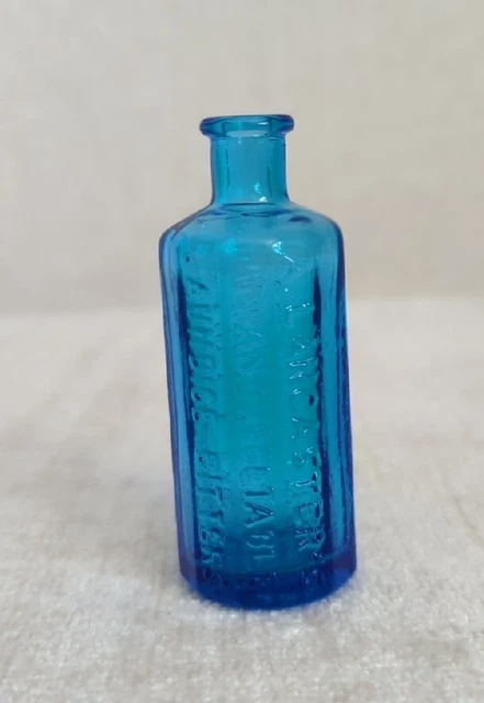 Wheaton A. Lancaster’s Indian Vegetable Jaundice Bitters Blue Glass Bottle 3"