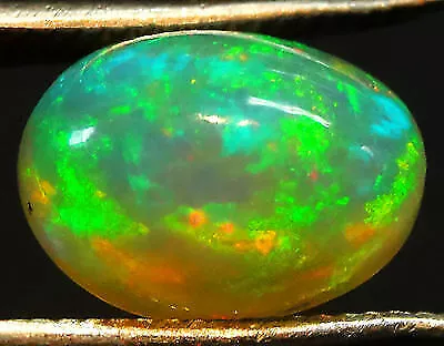 2,55 ct 100% Naturel Top Rainbow Fire Ethiopian Welo Opal CAB OVALE TAILLE...