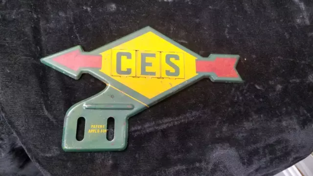 Vintage Metal Yellow Sign With Red Arrow Initials CES On It 8" Long