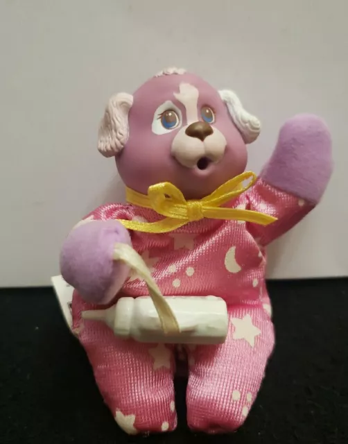 Vintage 1992 Hasbro Puppy Surprise “It’s a Girl” puppy with pink pajamas.Whit