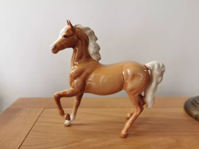 BESWICK HORSE, PRANCING ARAB GLOSS PALOMINO No.1261.