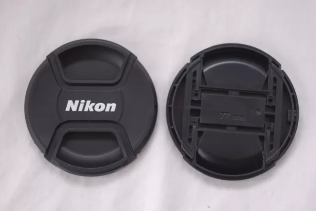 Two Nikon 77mm Front Lens Caps Center Pinch in Excellent Condition