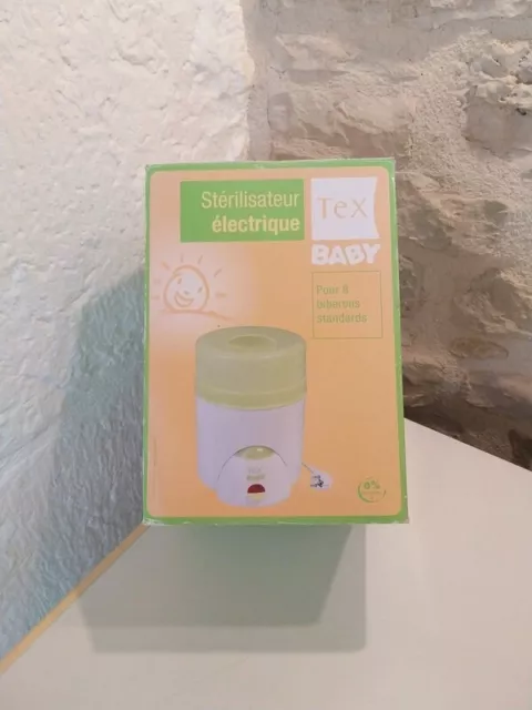 Stérilisateur électrique pour biberons tex en tres bon etat