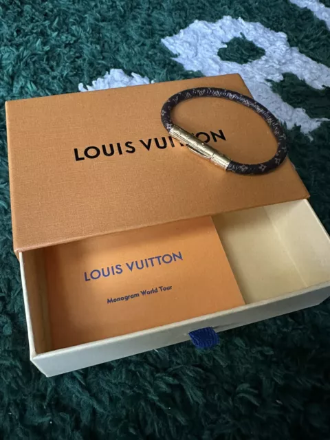 Roath's Pawn Shop Ltd. - ***SOLD*** Louis Vuitton Historic Mini Monogram  Bracelet 6.7 inches (length) Monogram canvas Calf leather lining Brass with  shiny gold finishing Historic studs engraved with the Louis Vuitton
