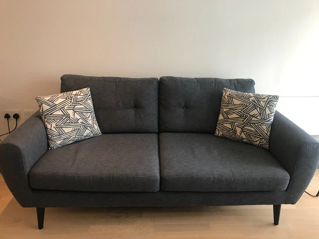 Jack 3 Seat Sofa in Textured Blue with Mahogany Legs in excellent conditions.