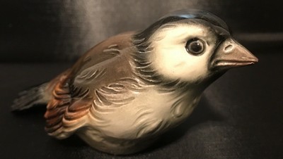 brown bird figurine