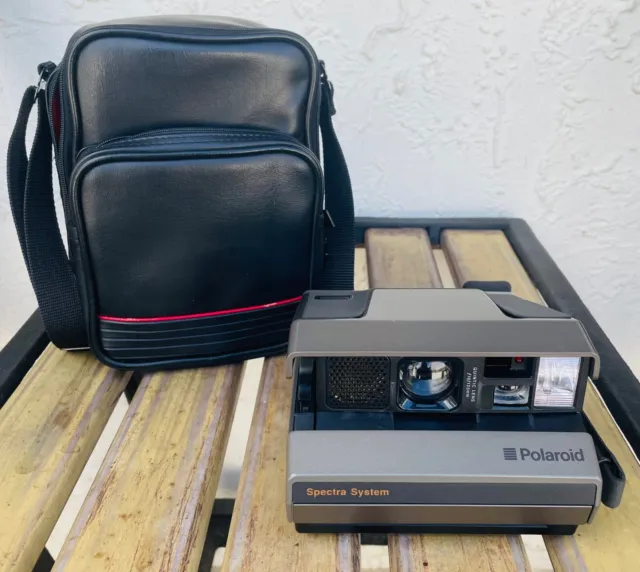 Cámara vintage del sistema Polaroid Spectra funciona con estuche