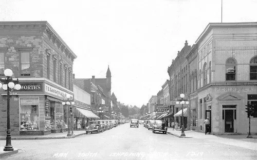Main Street View Woolworths Store Ishpeming Michigan MI Reprint Postcard