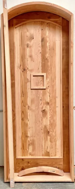 Rustic castle reclaimed lumber arched old growth Doug Fir solid door winery