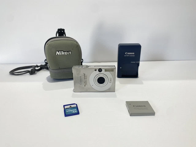 Canon PowerShot Digital ELPH SD1000 7.1MP Digital Camera - Silver Battery Case