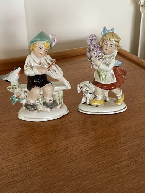 Antique Pair Of Porcelain Hand Painted Figures