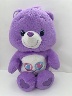 purple care bear with two lollipops