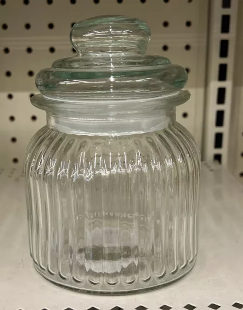 https://www.picclickimg.com/aogAAOSwoFZiQJ9w/Ribbed-Glass-Jars-with-Glass-Lids-24-oz.webp
