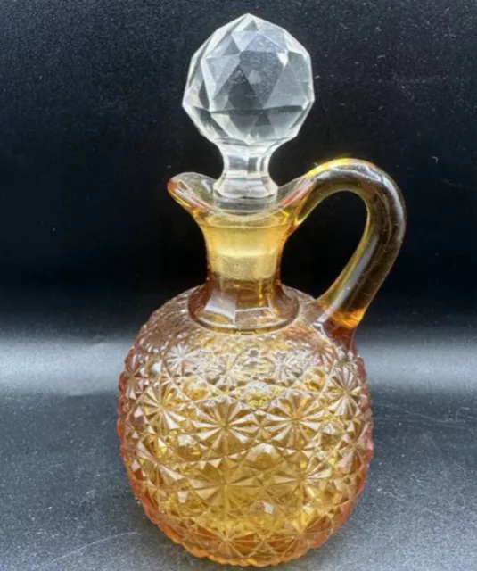 Fenton L.G. Wright glass Daisy & Button pattern amber cruet with clear stopper.