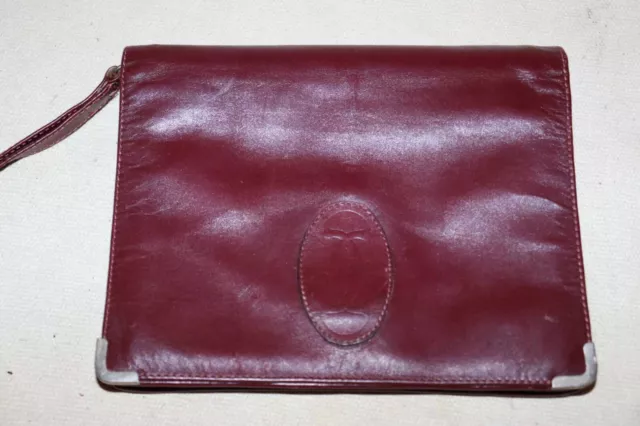 pochette en cuir Bordeaux de la marque Cartier produits vintage 1970-1980