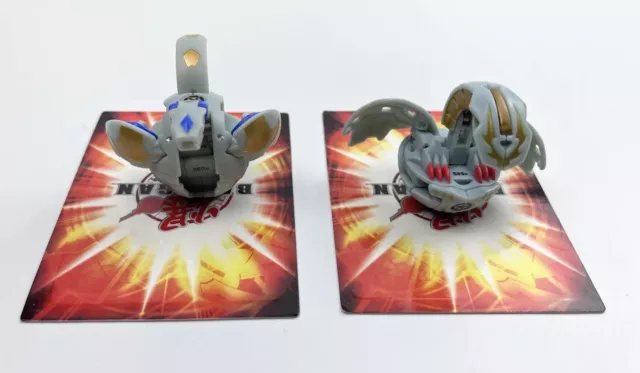 Lot Of 2 Bakugan Battle Brawlers Pyro Dragonoid Gray 560g & Gray Apollonir 580g