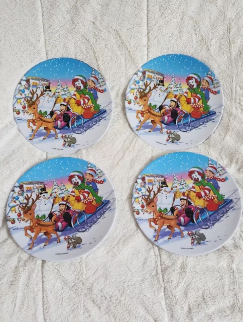 2009 McDonald’s Christmas plate Ronald on a sled reindeer Suncoast 9” SET OF 4