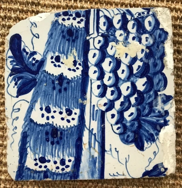 Antique 18C Dutch Delft Blue And White Tile Featuring Flowers And Grapes