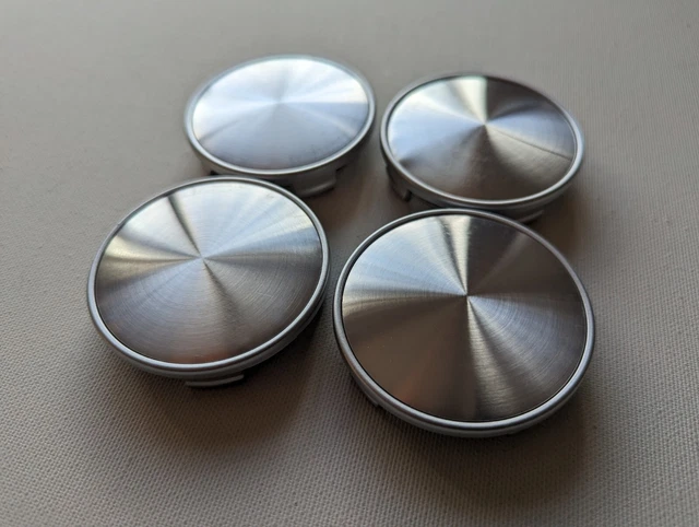 TAPPI CENTRALI RUOTA IN LEGA 65 MM ARGENTO X4 MONTAGGIO UNIVERSALE Dimensioni In Descrizione