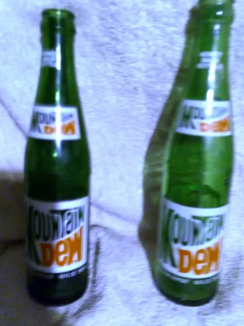 2 1977 Semi Vintage 10oz Mountain Dew Bottles Dark green No Noticable Wear Marks