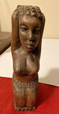 Hand-carved African Wooden Statue of a Woman. Intriguing, captivating, powerful