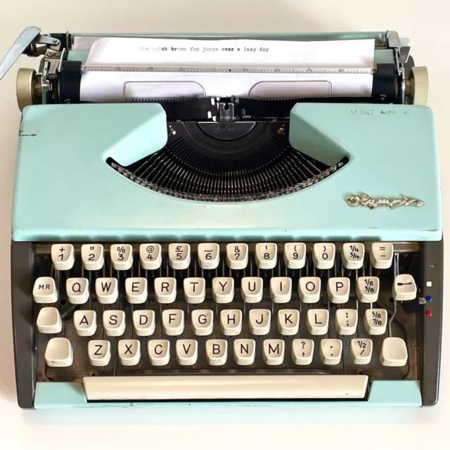 Beautiful Vintage Olympia SF DeLuxe Typewriter w Case BLUE 1960s West Germany