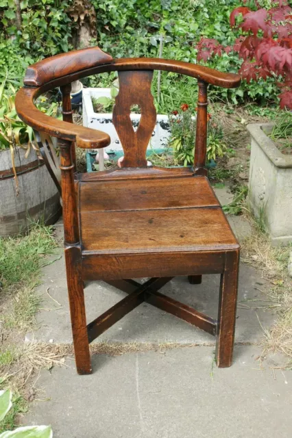 An Elm  Georgian corner chair circa 1750.