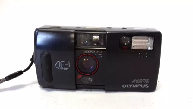 Olympus AF-1 súper cámara fotográfica cuerpo negro correa de muñeca lente de 35 mm vintage #133