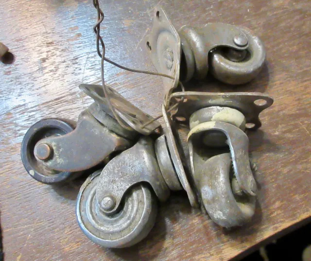 4 Vintage Casters Old All Iron Wheels Flat tops  3/4 " wheels "Daisy"
