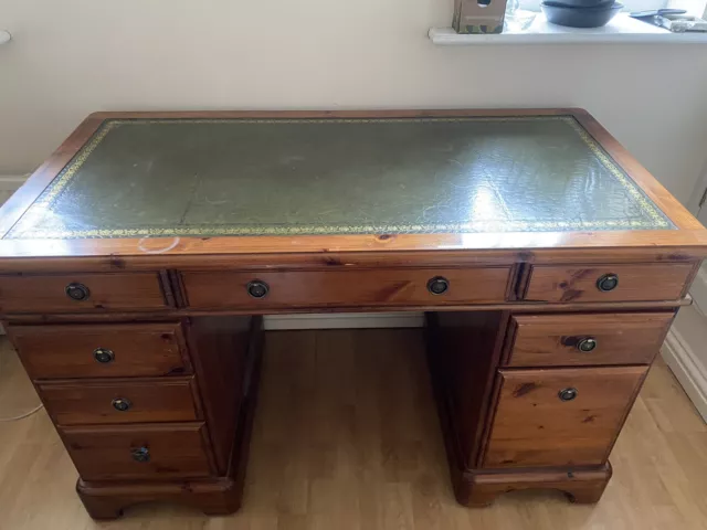 Ducal waxed pine desk with leather inlay and drawers