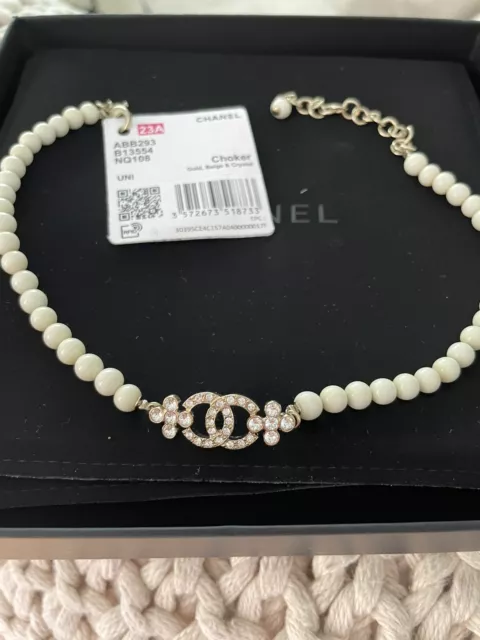 CHANEL CHOKER 23A Metal, Glass Pearls & Strass Gold, Beige