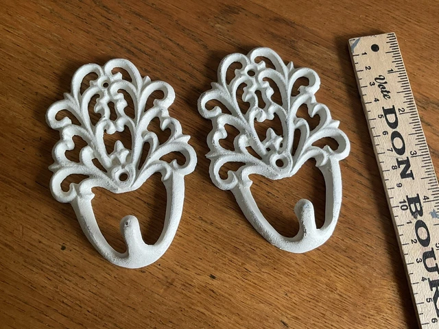 Two Cast Wall Hooks