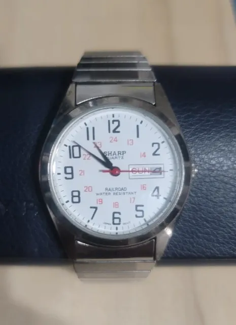 Silver-Tone Sharp Quartz Railroad Date/Day Watch Stretch Band Watch- New Battery