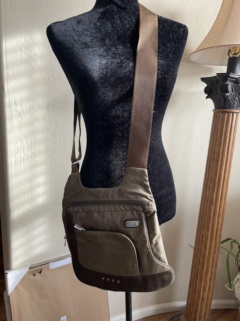 Tumi Tech Mckenna Bag,Crossbody, Color  Black/interior Is Red.