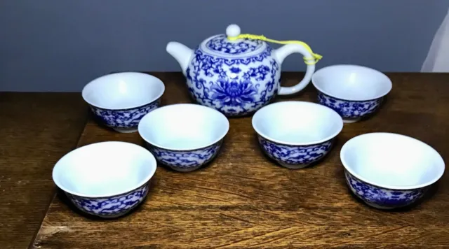 Rare Sake Set With Teapot And Six Cups Blue And White Lotus Flower Design