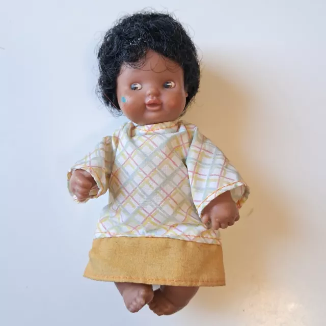 Muñeca barriguita negra shop