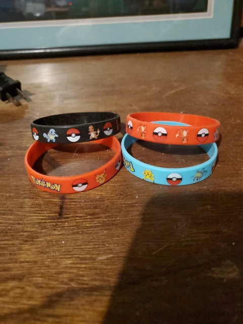 POKEMON Silicon Rubber Wrist Bands Bracelets x4 Assorted Colours Party Red Blue POKEMON Silicon Rubber Wrist Bands Bracelets x4 Assorted Colours Party Red Blue