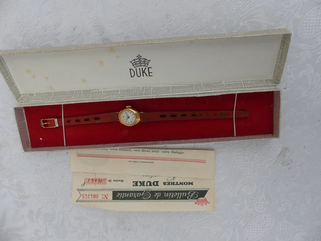 Montre Vintage Duke Mécanique - Boîtier Plaqué Or, Cadran Blanc, Années 1940-1970