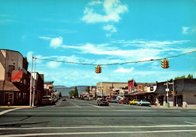 VINTAGE CONTINENTAL SIZE POSTCARD GUNNISON COLORADO STREET SCENE 1960s/1970s