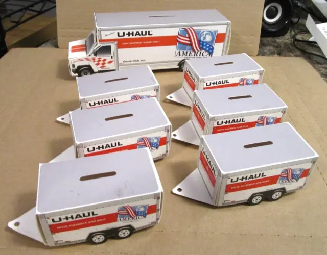 lot of 7 used U Haul cardboard coin banks van truck trailers